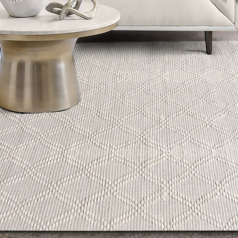 SAUL - tappeto in lana avorio con decoro