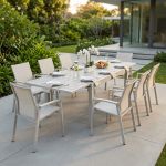 JERRI - set tavolo in alluminio cm 135/270 x 90 x 75 h con 8 poltrone Lotus