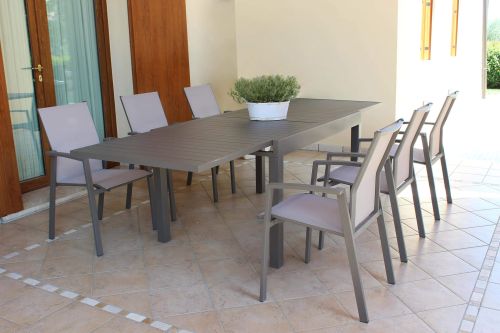 JERRI - set tavolo in alluminio cm 135/270 x 90 x 75 h con 6 poltrone Lotus