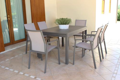 JERRI - set tavolo in alluminio cm 135/270 x 90 x 75 h con 6 poltrone Lotus